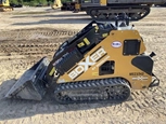Side of used Mini Skid Steer
